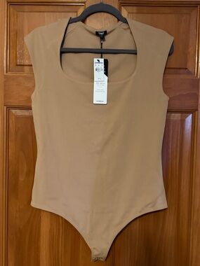 NWT express body contour bodysuit nude color size L